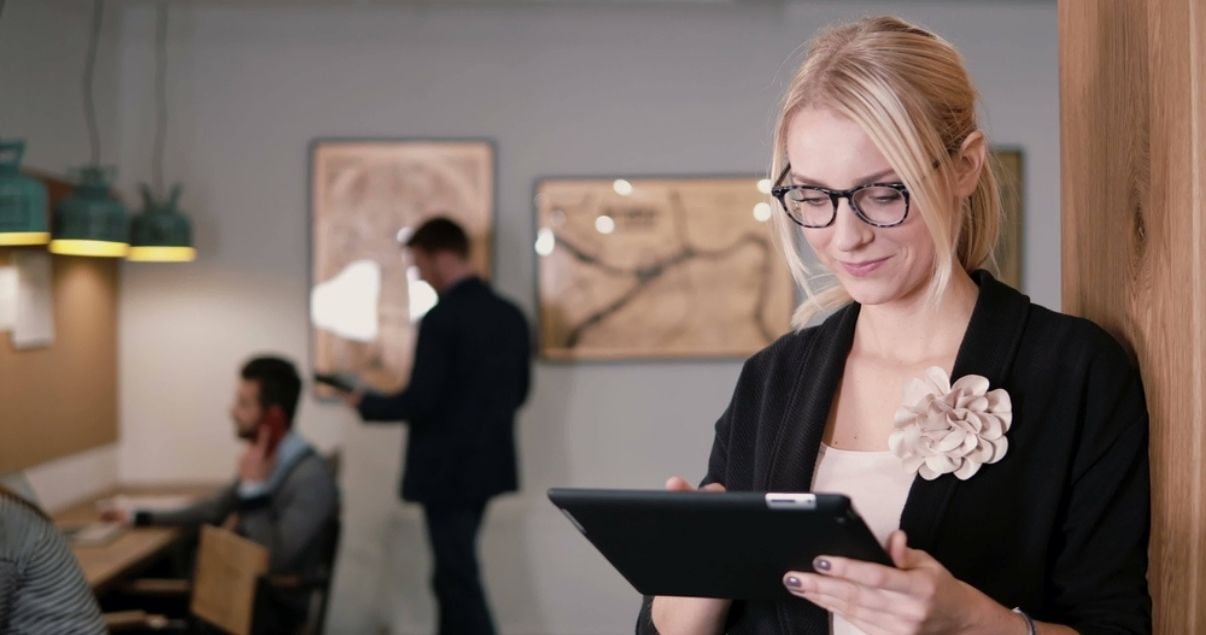 Female office worker collaborating with workplace safety