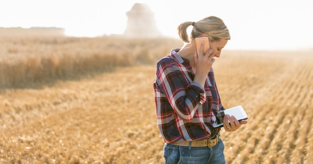 Woman collecting data in the field with Kizeo Forms