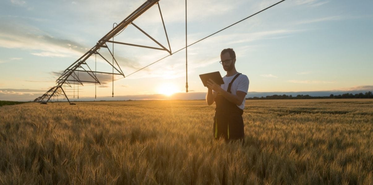 Young male engineer improving farm management with Kizeo Forms